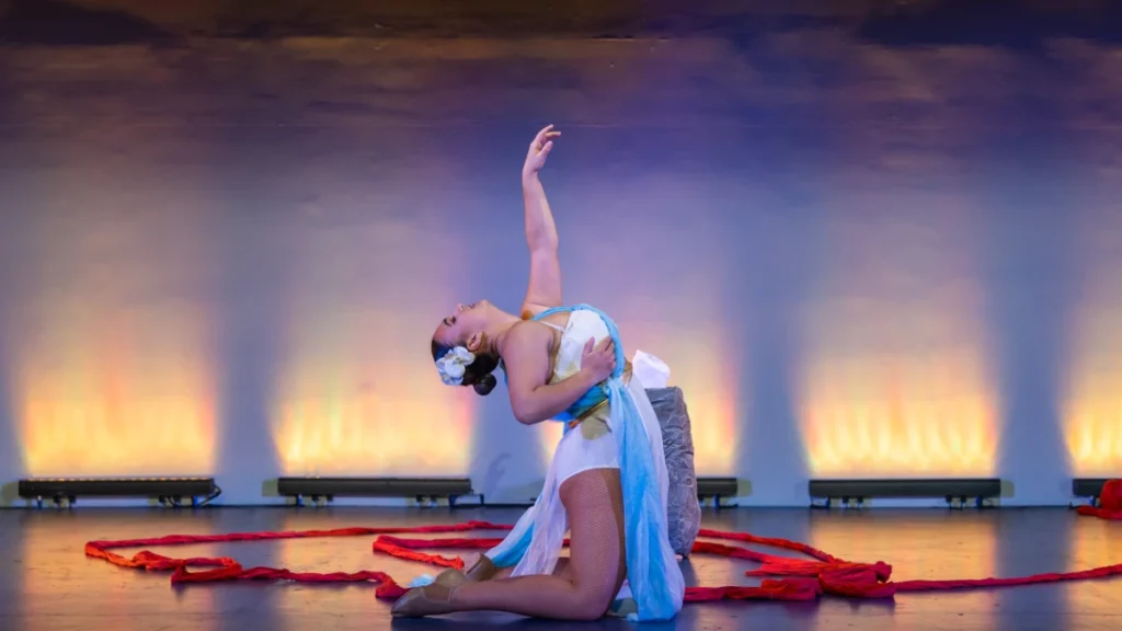 Europa in a graceful, expressive pose, inspired by Greek mythology dance theatre performance