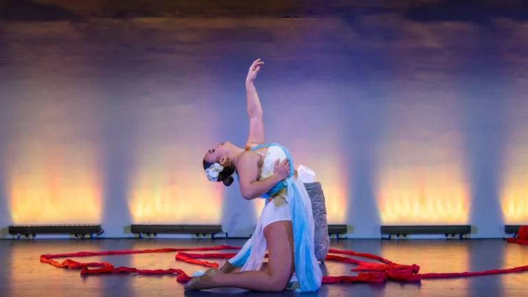 Europa in a graceful, expressive pose, inspired by Greek mythology dance theatre performance