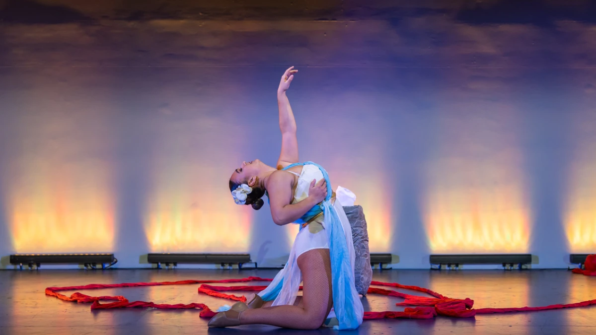 Europa in a graceful, expressive pose, inspired by Greek mythology dance theatre performance